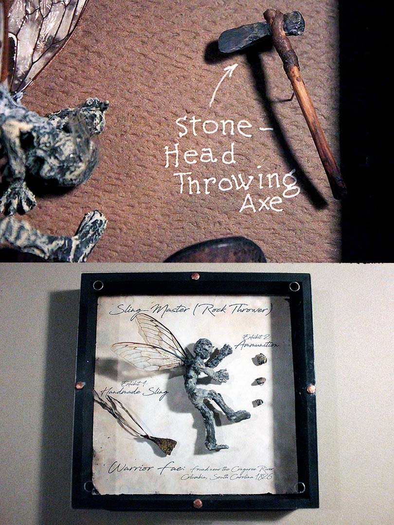 Two images of dead faeries. One contains a close-up of the faerie's throwing axe, and the other shows the full tray containing a "Sling Master" (Rock Thrower) and his weapon of choice with Victorian handwritten labels